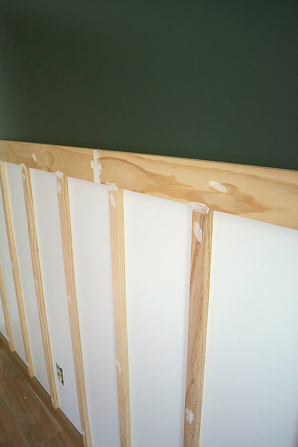 use wood filler to patch holes before painting board and batten