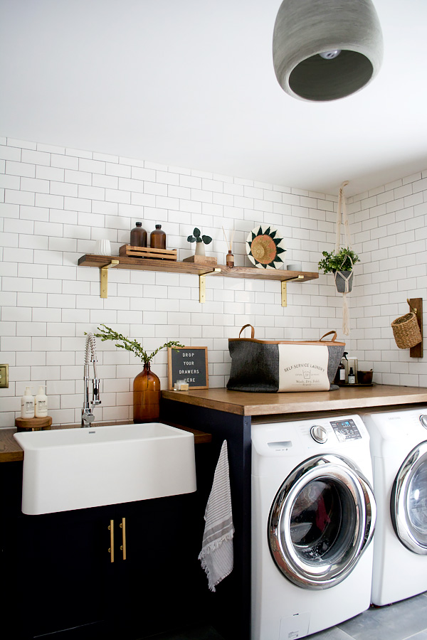 Modern Farmhouse Laundry Room with Navy Cabinets
