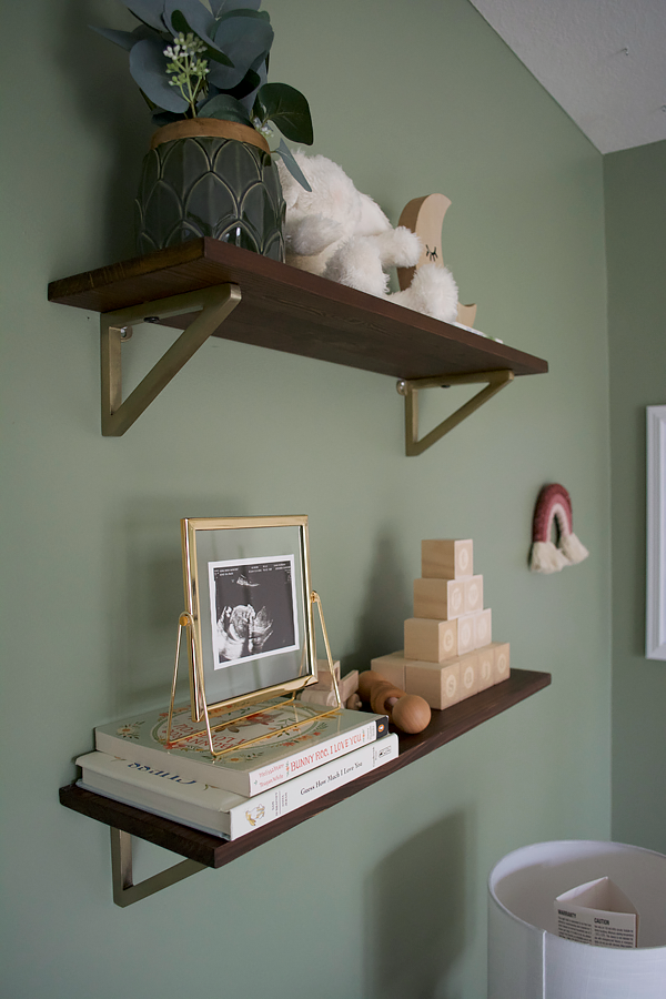 Floating Shelves in a girl's green and pink nursery