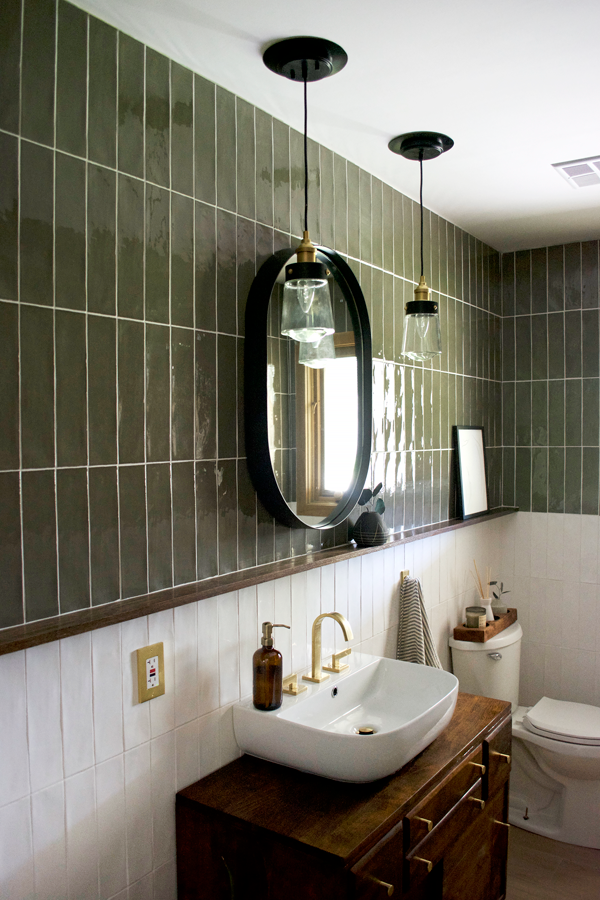 Green and White Vertical Stacked Tile in Bathroom